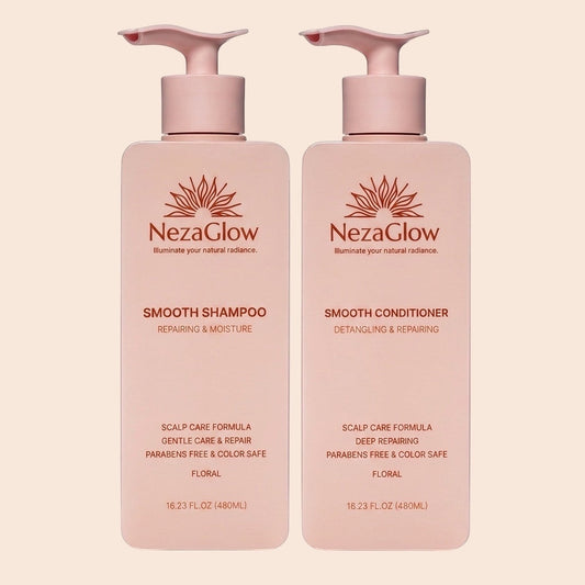 NezaGlow Smooth shampoo and conditioner set in matte pink bottles with pump dispensers for hair repair and hydration.